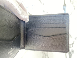 BRAND NEW- Limited edition Louis Vuitton Slender Wallet in black